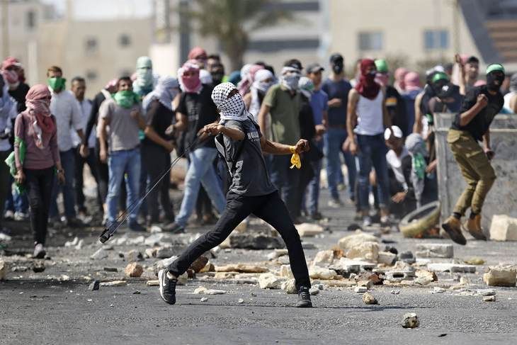 Palestine Protesters throwing rocks Palestine Protesters throwing rocks Palestine Protesters throwing rocks Palestine Protesters throwing rocks